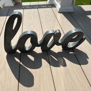 Wooden love sign that can be hung on wall or stand alone on a flat surface